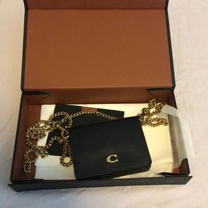 Authentic Coach Mini wallet on the chain